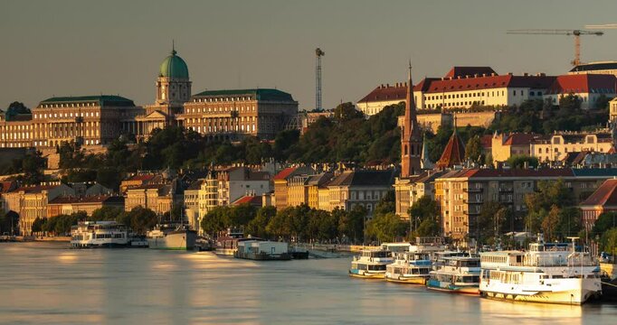 Budapest, Hungary - September 22, 2024: Captivating Sunrise View of Buda from Budapest's Margit Bridge. Timelapse, slide transition.