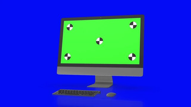 Modern computer with green screen, isolated on blue background . 3d render.