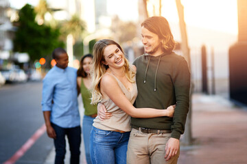 Fototapeta premium City, laughing and couple with hug for travel, vacation journey and bonding together for anniversary. Happy people, man and woman with love for relationship, dating and joke for walking in downtown
