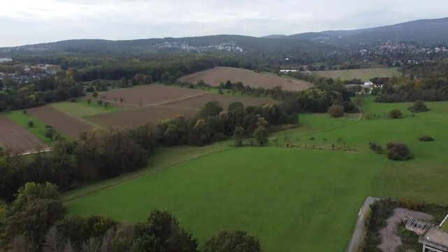 Aerial view of a rural area outside Schwalbach on the side of the mountain range Taunus, Hesse, Germany.