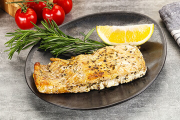 Baked salmon fish served rosemary