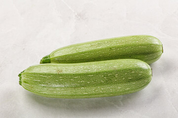 Raw green ripe zucchini vegetable