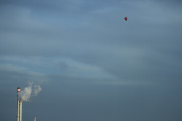Flying ball, factory, smoke from chimneys