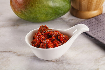 Spicy pickled raw green mango