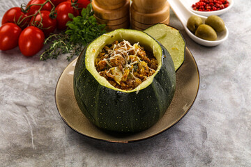 Baked round zucchini with meat