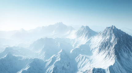 Obraz premium Majestic snow-covered mountain range stretching beneath a clear blue sky in a stunning landscape