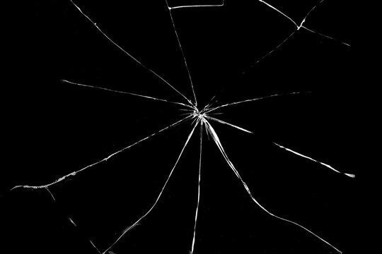 bullet hole on glass black background for overlay, transparent window