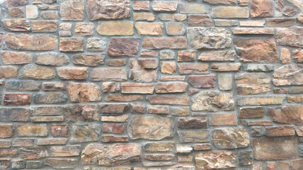 Close up of a stone masonry wall.