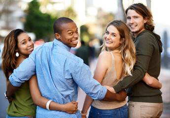 Hug, portrait and friends in city for travel, vacation journey and bonding together for reunion...