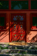 Ulaanbaatar, Mongolia - August 5, 2024 - Scene of decorated door of Dzuu Temple in Gandantegchinlen Monastery