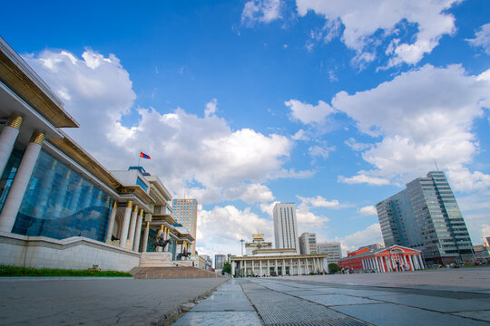 Ulaanbaatar, Mongolia - August 5, 2024 - Scene of Sukhbaatar Square, central square of Ulaanbaatar, features an equestrian statue of Damdin Sukhbaatar for Mongolian's revolutionary hero