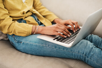 Woman, relax and hands with laptop on sofa for research, information and browsing on internet. Network, connection and female person with technology at home for online shopping, website and ecommerce