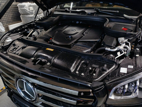 Moscow, Russia &ndash; October 17, 2024: A close-up of the front of a Mercedes Benz car. The hood of the car is open and we see a powerful modern engine.