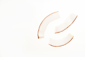 Cocos nucifera - Pile of dehydrated shredded coconut with sugar.