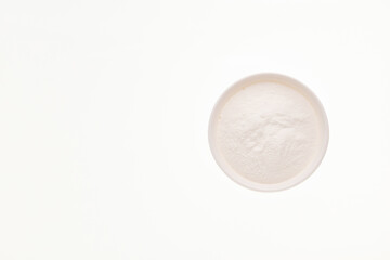 Baking soda - Crystalline solid compound in the bowl.