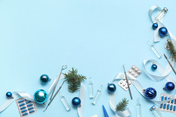 Composition with different medicines, dentist's tools and Christmas decorations on color background