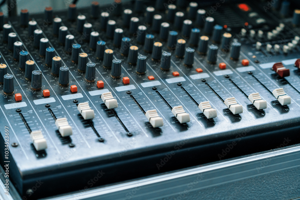 Wall mural amplifier mixer and equalizer in studio room in close up view. uds