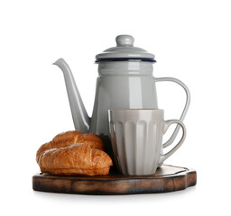 Teapot with cup and croissants on white background