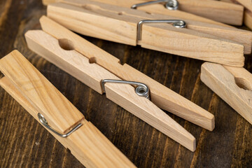 a group of wooden clothespins for drying clothes