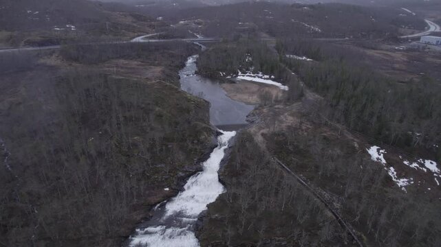 a beautiful waterfall in the mountains of norway, D-Log for better color grading