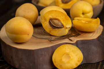 ripe soft apricot fruits on the cutting board