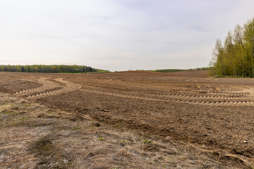 plowed fertilized fertile soil for obtaining a new crop