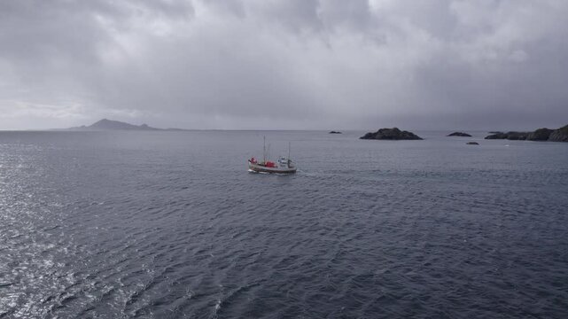 fishing boat on the ozean on lofotenin norway, D-Log for better processing