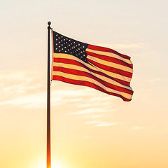 American flag waving against a beautiful sunset background.