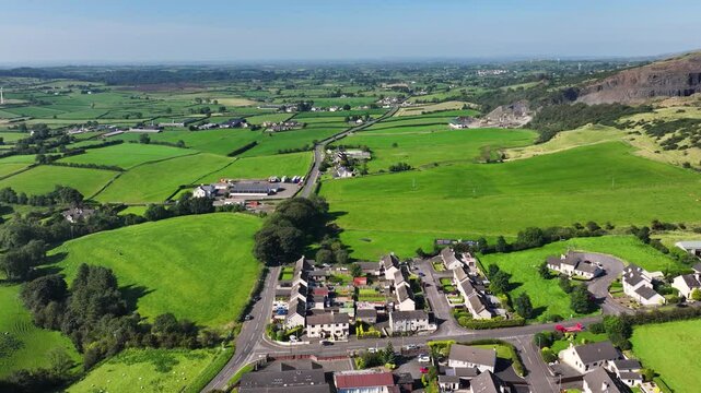 Aerial view of Residential homes, town houses, bungalows, housing, in Corkey village Co Antrim Northern Ireland