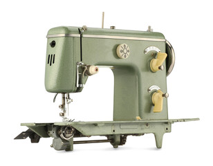 One vintage sewing machine isolated on white