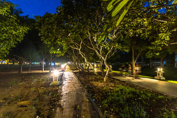 The natural background of the road surrounded by nature, big trees, waterfalls from high mountains and clear sky throughout the adventure journey.