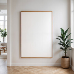 Frame Mockup. Modern Scandinavian minimalist interior with large blank frame on the wall and potted green plant in a woven basket natural light clean design wooden floor and subtle decor