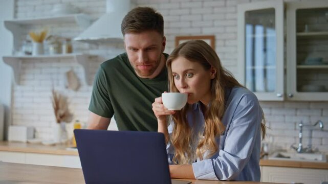 Happy distance friends chatting online from home kitchen closeup. Couple talking