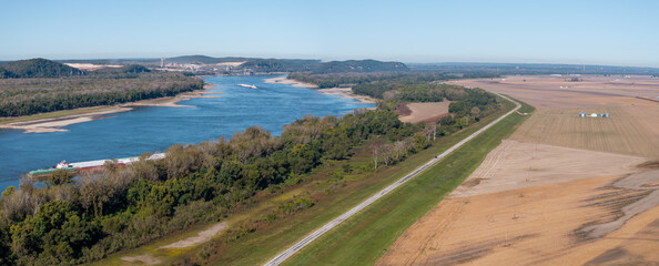 River Barges working up stream in low water on the Mississippi River.