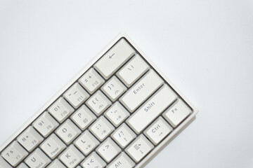 Top view of white mechanical keyboard, white keyboard with various layouts isolated on a white background.