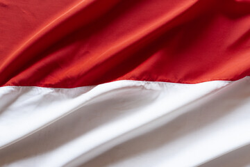 Top View of Wavy Red and White Indonesian Flag.
