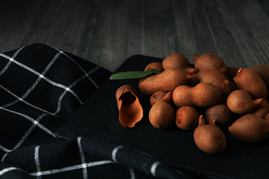 Tamarind fruit, concept of delicious food, fresh tamarind