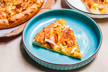 slice of pizza on a plate