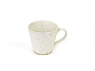 Side view, empty beige mug with dotted isolated on white background. Blank beige mug with dotted ceramic cup mockup and template for design, banner. Use for home or restaurant.