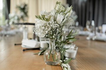 table decoration in a restaurant for a wedding banquet