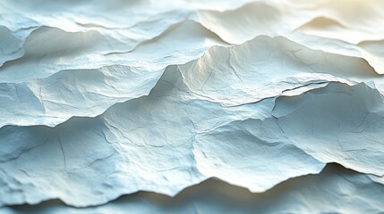 Obraz premium The surface features intricately crumpled paper layers, illuminated by soft light that enhances the textures and shadows, giving a delicate yet dynamic appearance.