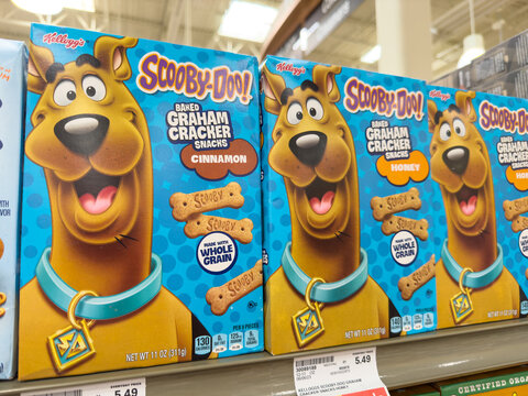 Scooby-Doo graham crackers in various flavors on shelf.