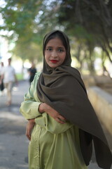 muslim woman walking on the street