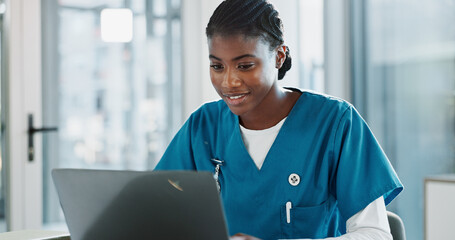 Clinic, doctor and black woman with laptop, typing and thinking with research, online reading and...