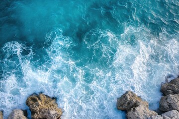 Obraz premium Aerial View of Turquoise Sea and Rocks