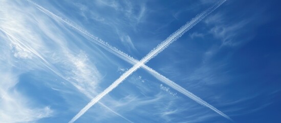 Aircraft Vapour Trails Forming Saint Andrews Cross In The Sky