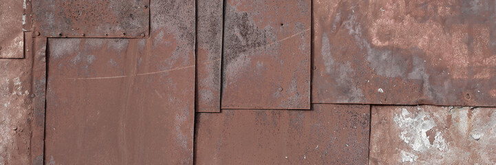 Old rusty metal texture. Rust on the surface of the iron wall. Panoramic background for grunge design.