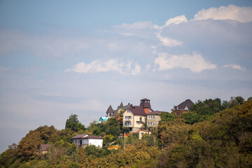 A small town with houses and trees in the background