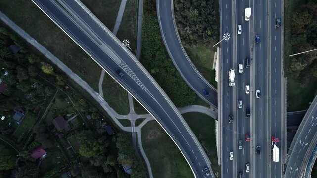 Forming of traffic jam on highway road of Warsaw, aerial top down view