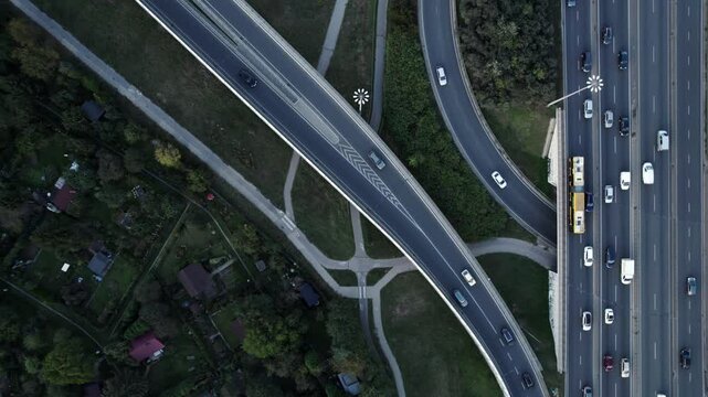 Road leading to S8 highway in Warsaw with forming jam, aerial top down view